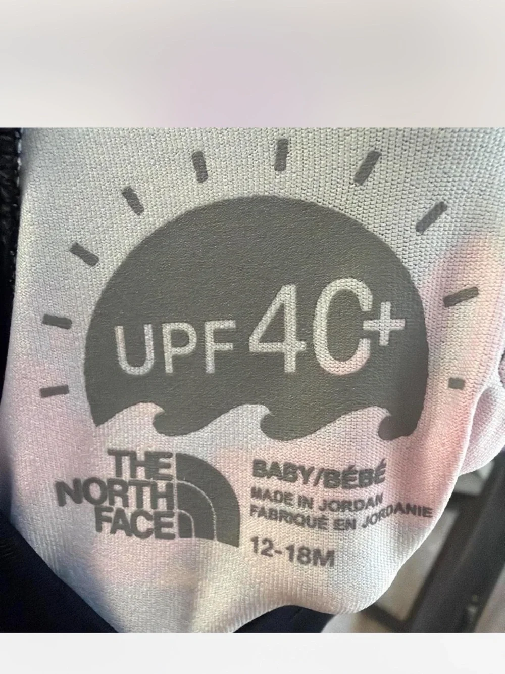 The North Face Kids Long-Sleeve One-Piece Rashguard - Black, Pink, Blue, Gold